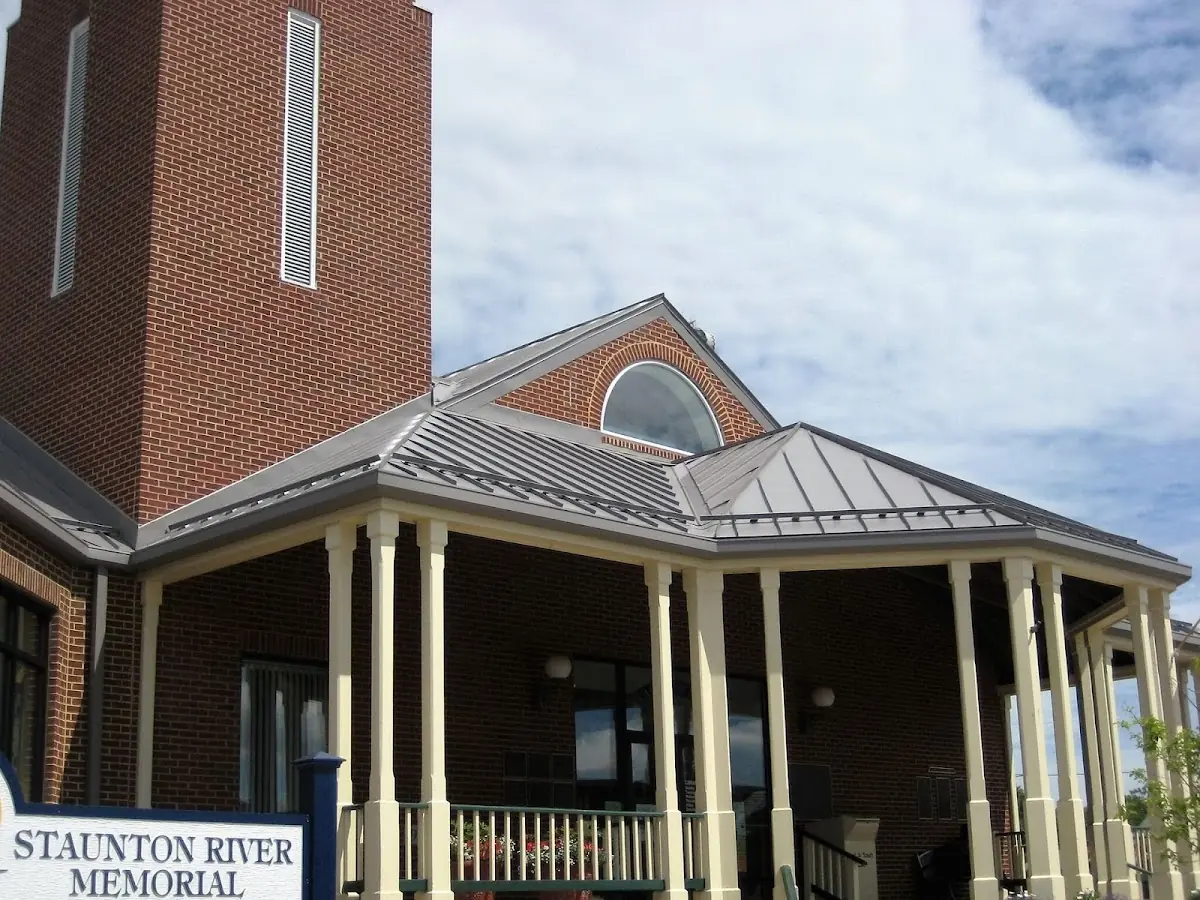 Skilled roofing craftsmen working on a residential roof in Cleveland